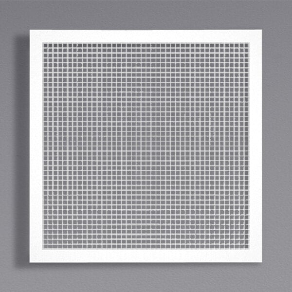 A white American Louver Company square grid with small squares on a wall.
