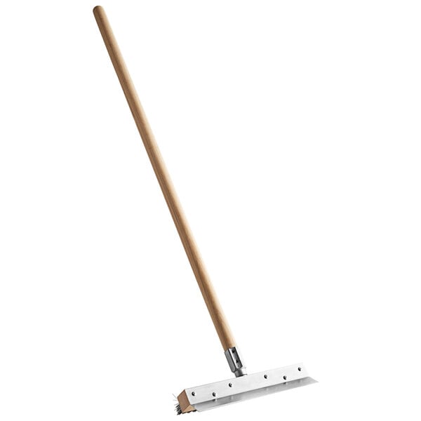 A long wooden stick with a wooden mop and a yellow scraper.