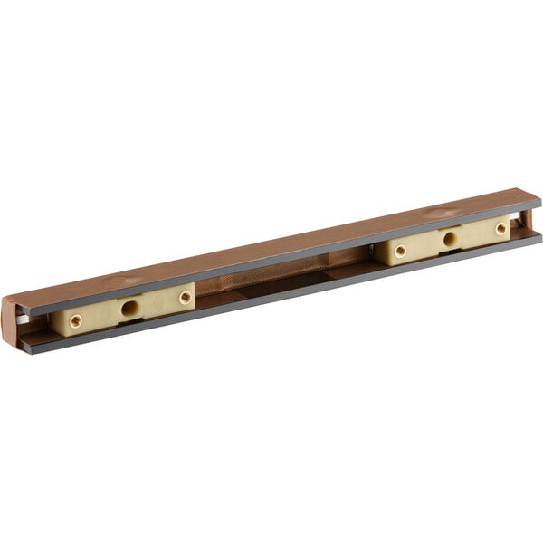A brown and black rectangular VacPak-It seal bar with brass ends.