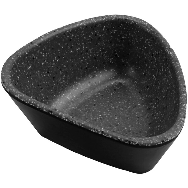 A stone grey cheforward triangular ramekin with a black and white speckled design.