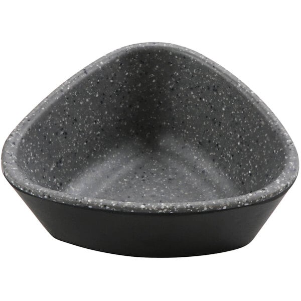 A stone grey cheforward ramekin with a white and grey speckled interior.