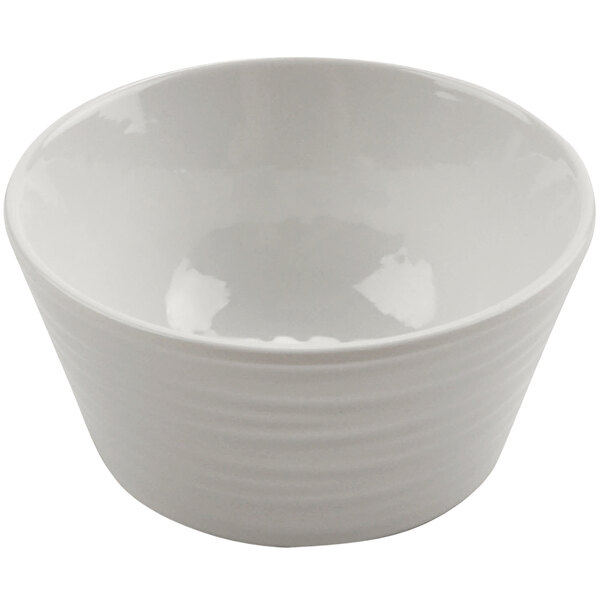 A white bowl with a curved edge.