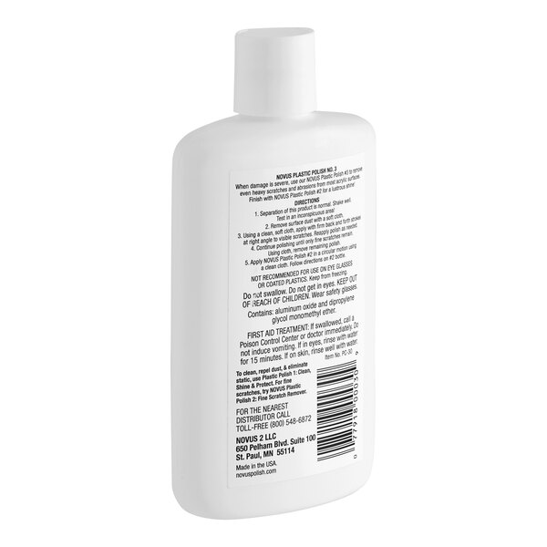 A white plastic cylinder of Novus PN-7080 Plastic Polish with black text.