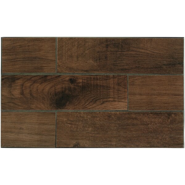 A rectangular ceramic hot well cover with a faux walnut wood surface.
