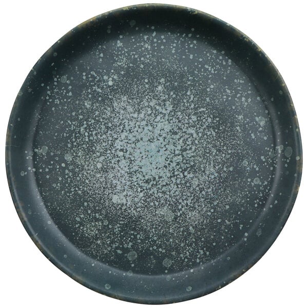 A round black cheforward melamine plate with white specks.
