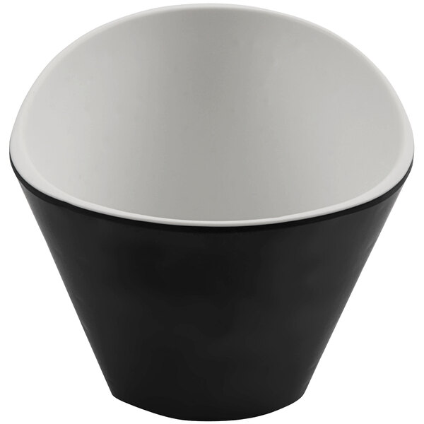 A cheforward black and white melamine ramekin with a white rim.