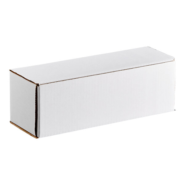 A white corrugated mailer box measuring 10 inches by 6 inches by 6 inches.
