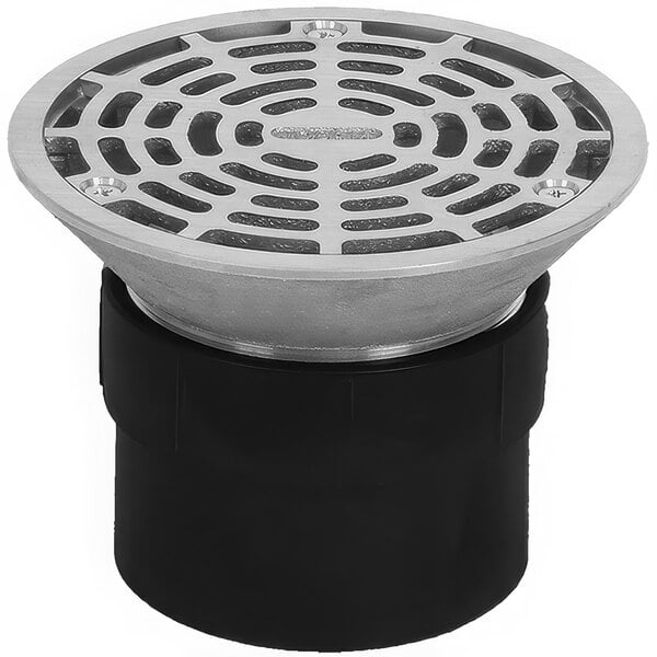 A round metal Josam floor drain with a black base and metal strainer with holes.