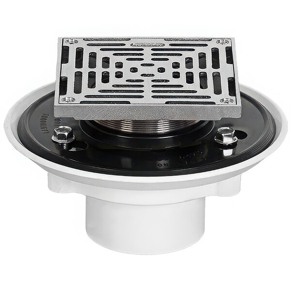 A white Josam adjustable floor drain with a metal Nikaloy strainer with holes.