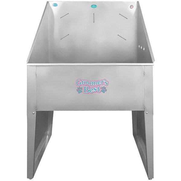 A silver metal Groomer's Best bathing tub with a hole in it.
