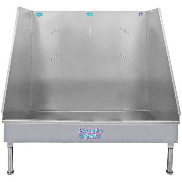 A gray metal Groomer's Best walk-in pet bathing tub with a blue lid.