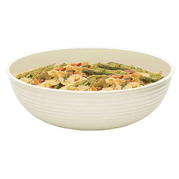 A white Cambro Camwear round ribbed bowl filled with pasta, asparagus, and tomatoes.