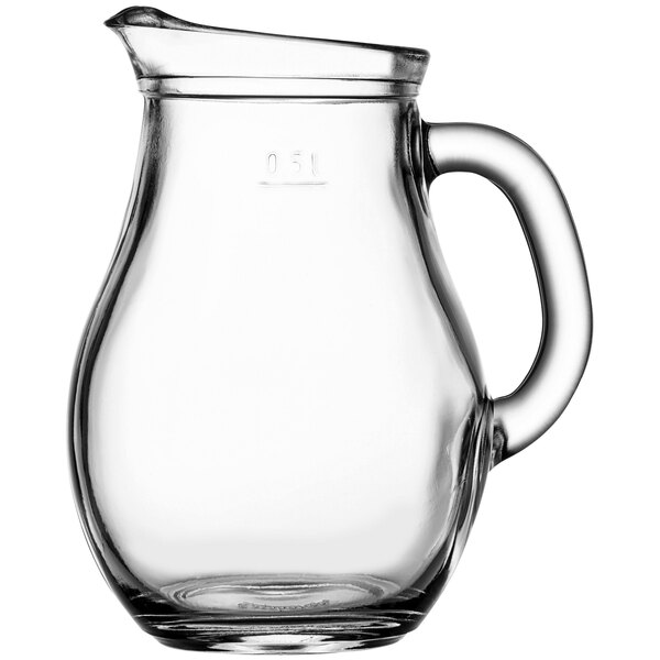 A Pasabahce clear glass pitcher with a handle.