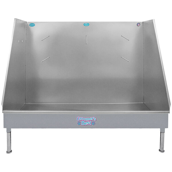 A silver metal Groomer's Best walk-in bathing tub with a blue bench.