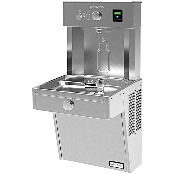 A Halsey Taylor stainless steel water fountain with a water dispenser.