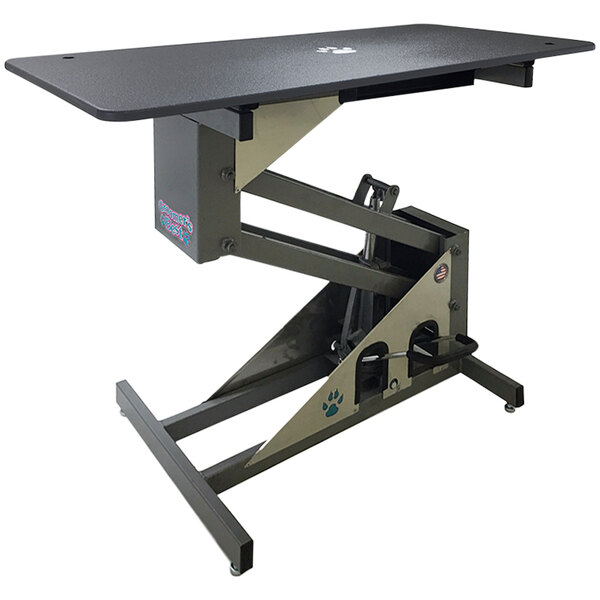 A black Groomer's Best grooming table with a metal frame.