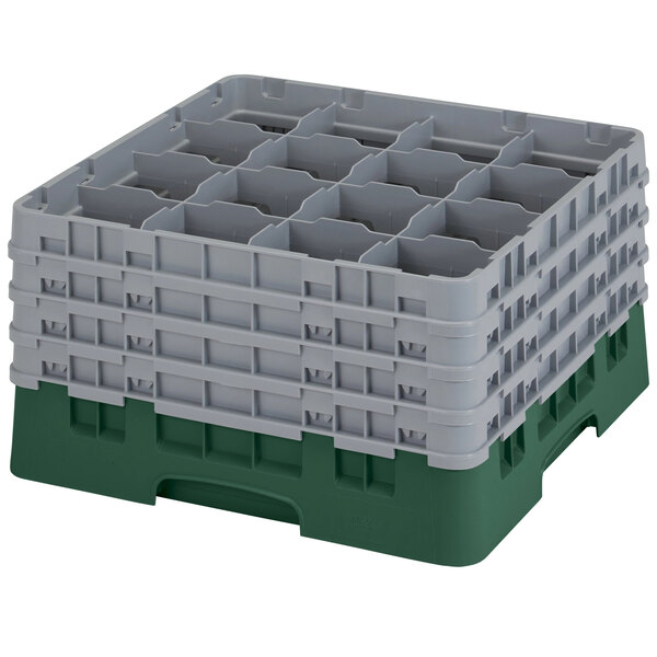 A green plastic Cambro glass rack with 16 compartments.