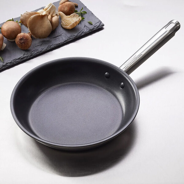 A non-stick fry pan with a stainless steel handle.