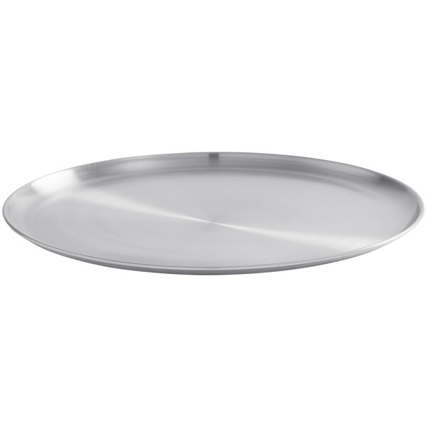 An American Metalcraft stainless steel plate with a circular surface.