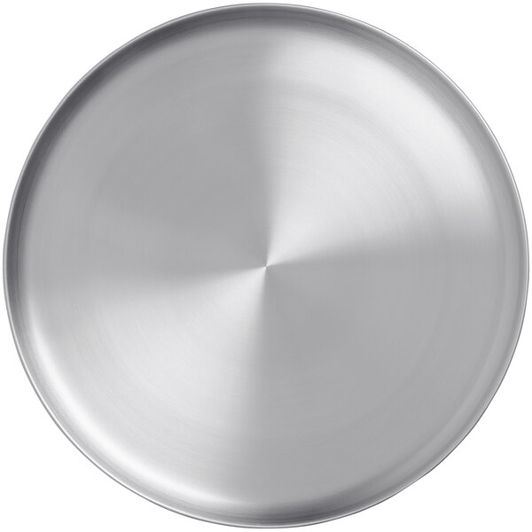 An American Metalcraft satin stainless steel plate with a circular design.