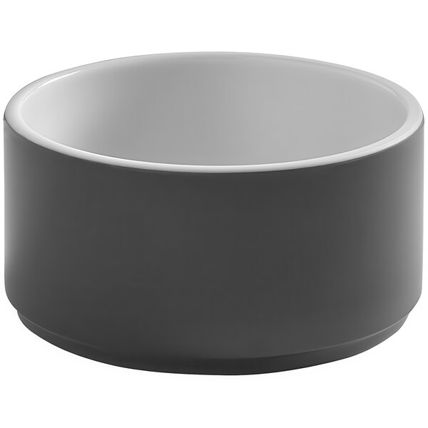 An American Metalcraft Unity graphite melamine bowl with a white rim.