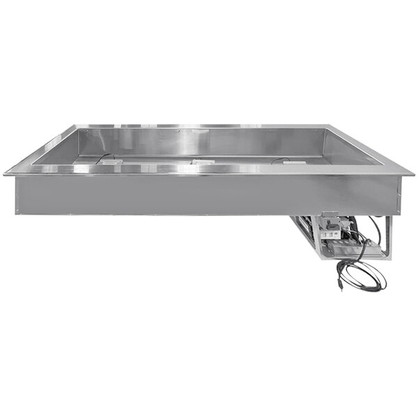 A stainless steel rectangular drop-in well for refrigerated food pans.