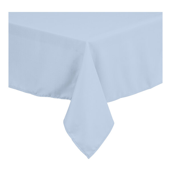 A light blue square tablecloth with a white border.
