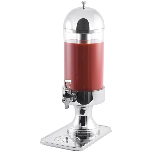 A Spring USA beverage dispenser with red liquid inside.