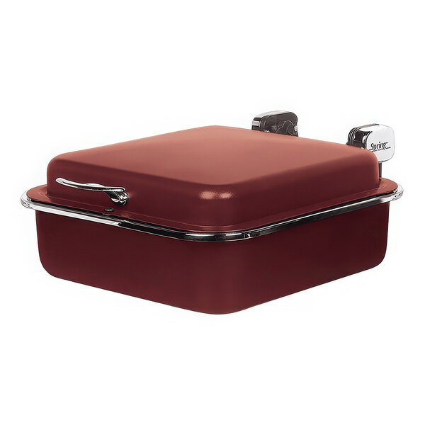 A red rectangular stainless steel chafer with chrome accents and a handle.