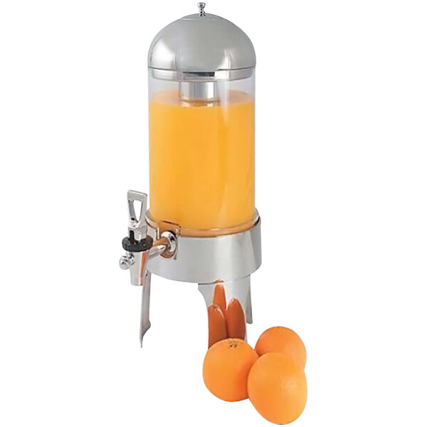 A Spring USA juice dispenser with oranges inside.