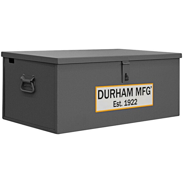 A gray metal Durham Mfg lockable steel welder box with a white label.