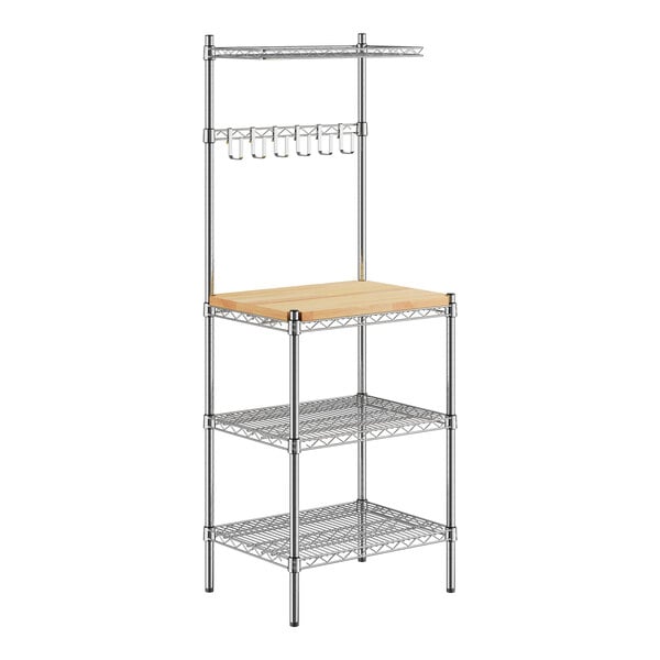 A chrome Regency wire baker's rack with wood shelves and a wood top.