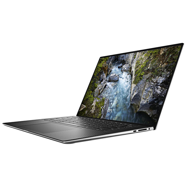 A Dell Mobile Precision 5560 laptop open to a river and rocks on the screen.