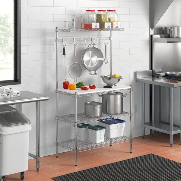 A Regency chrome baker's rack shelf in a kitchen with food items on it.