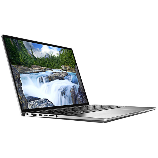 A Dell Latitude 9420 2-in-1 laptop with a waterfall on the screen.