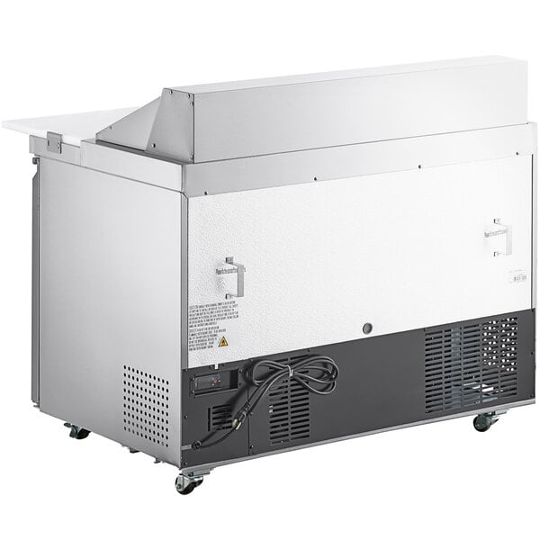 An Avantco stainless steel sandwich prep table with a cutting board.