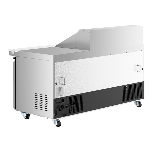 A large stainless steel Avantco refrigerator with three doors open.