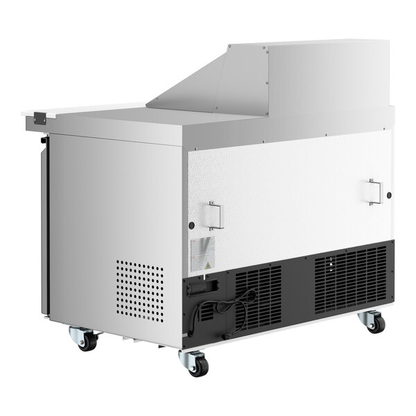 An Avantco stainless steel refrigerator with open doors.