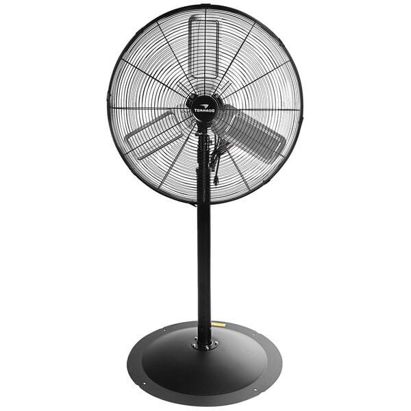 A black Tornado industrial pedestal fan on a white background.