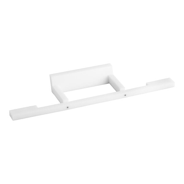 A white rectangular plastic pusher with a hole in the center.