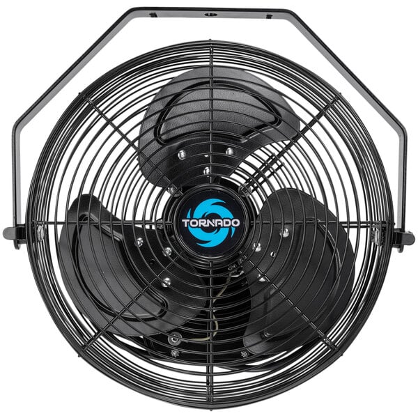 A close up of a black Tornado high-velocity wall fan with a blue logo.