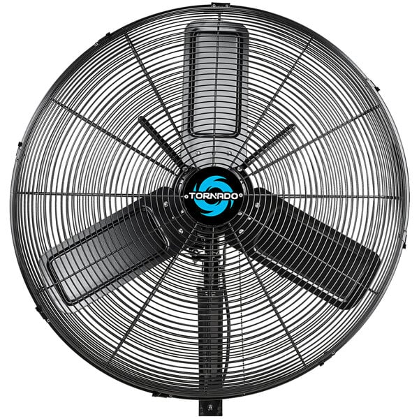 A close up of a black Tornado 24" outdoor oscillating metal wall fan.