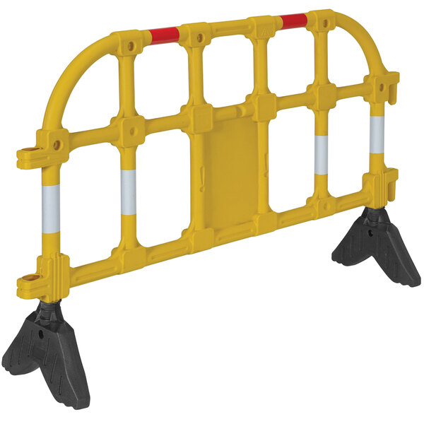 A yellow high-density polyethylene barrier with interlocking pieces.