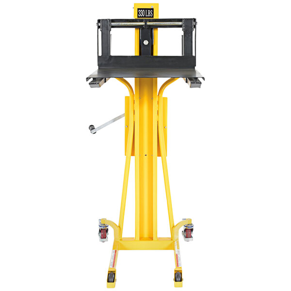 A yellow and black Vestil portable hand winch lifter.