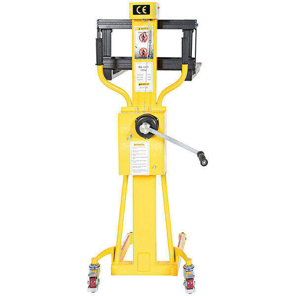 A yellow Vestil portable hand winch lifter with wheels.