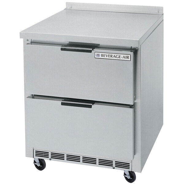 A Beverage-Air stainless steel worktop freezer with two drawers on wheels.