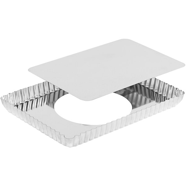 A white rectangular Gobel tart pan with a metal frame.