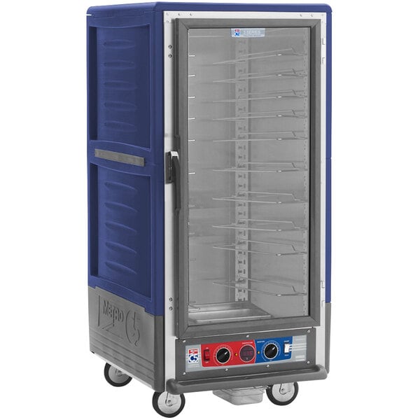 A blue and silver Metro C5 heated holding and proofing cabinet on wheels.