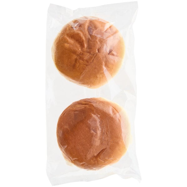 Two King's Hawaiian Original Hawaiian Sweet Sandwich Rolls in a plastic bag.