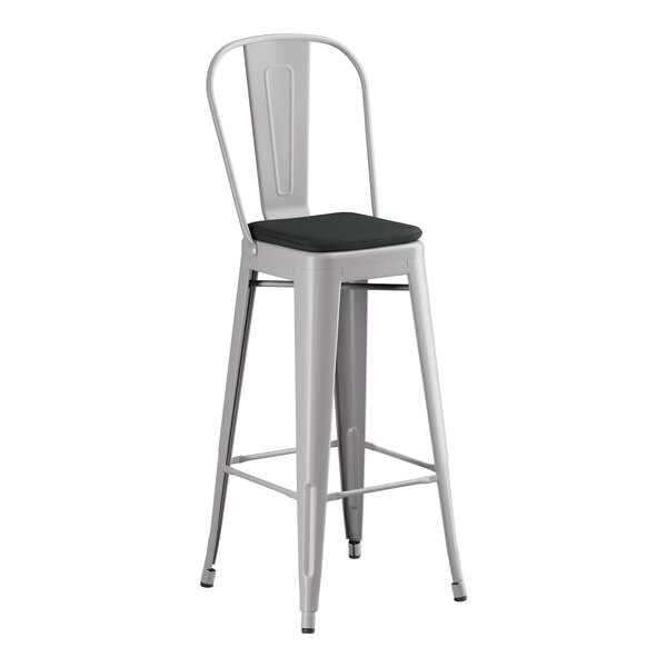 A Lancaster Table & Seating gray metal outdoor cafe barstool with black cushion.